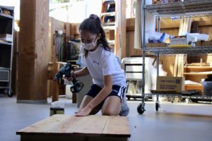 Girl woodworking
